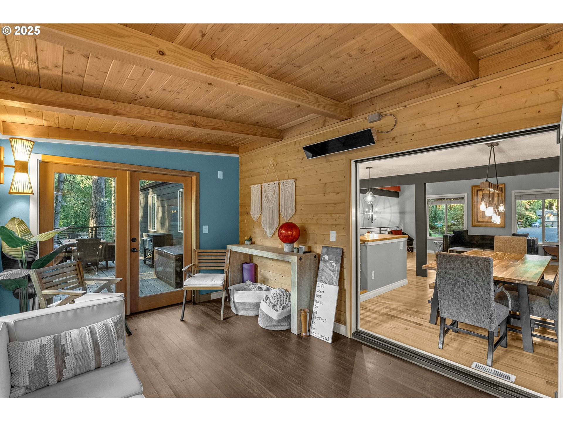 18863 Southwest Indian Springs Road Lake Oswego, OR 97035 - Photo 12 of 33 a man sitting on a bed in a hotel room