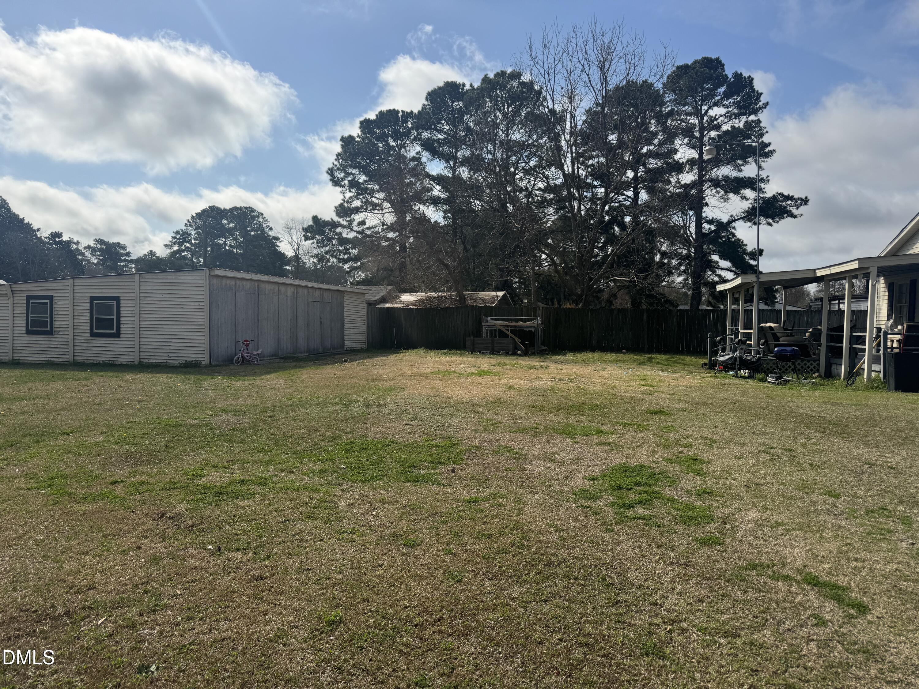 513 Pear Street Kinston, NC 28504 - Photo 11 of 11 a view of a house with a yard
