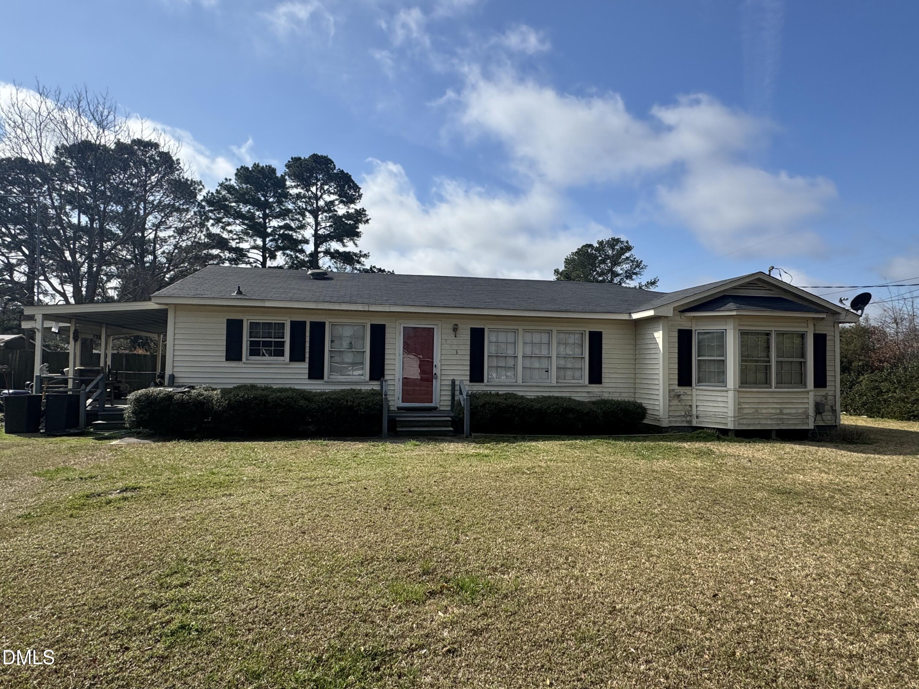 513 Pear Street Kinston, NC 28504 - Photo 2 of 11 a front view of a house with a yard