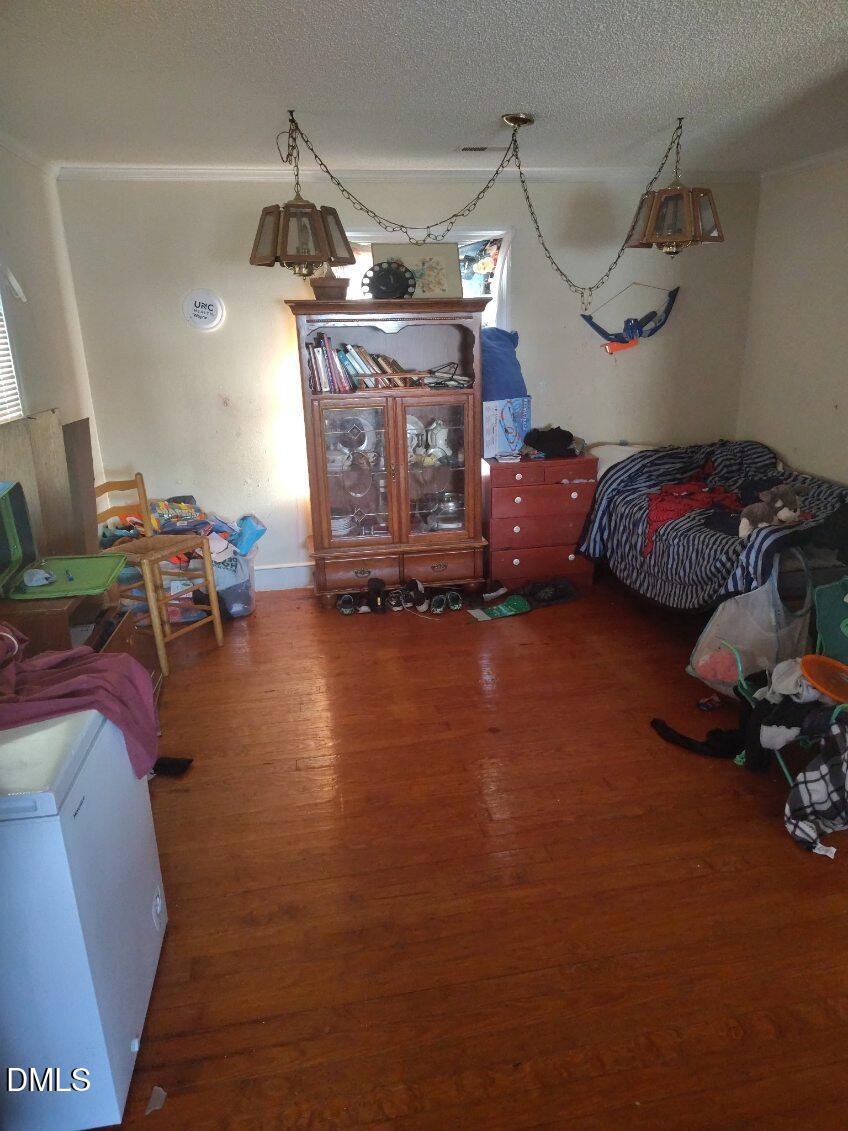 513 Pear Street Kinston, NC 28504 - Photo 4 of 11 a garage filled with furniture and gym equipment