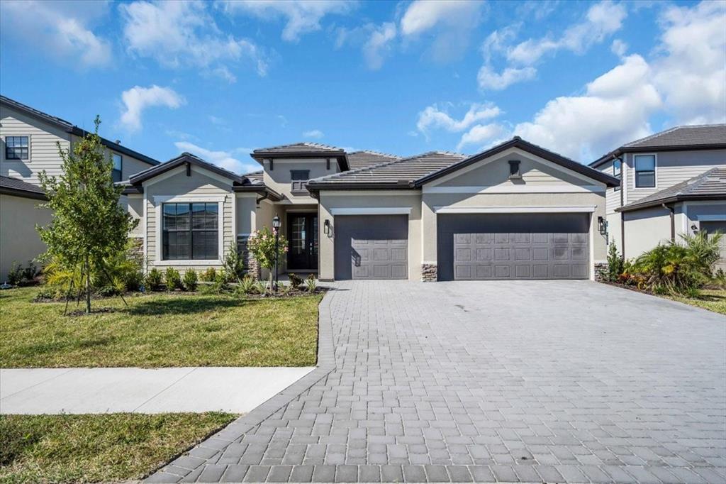 15159 Sea Salt Way Bradenton, FL 34211 - Photo 1 of 55 front view of a house with a yard