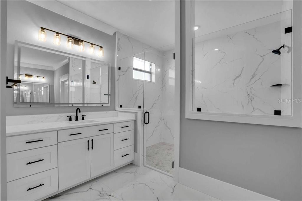15159 Sea Salt Way Bradenton, FL 34211 - Photo 11 of 55 a bathroom with a granite countertop sink mirror and double