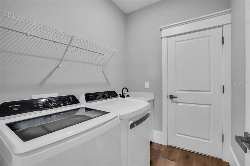 15159 Sea Salt Way Bradenton, FL 34211 - Photo 16 of 55 a utility room with dryer and washer