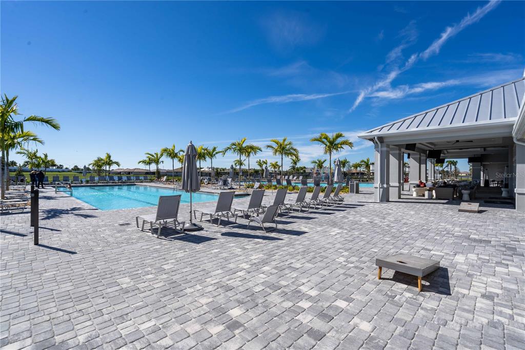 15159 Sea Salt Way Bradenton, FL 34211 - Photo 40 of 55 a view of a swimming pool with a patio