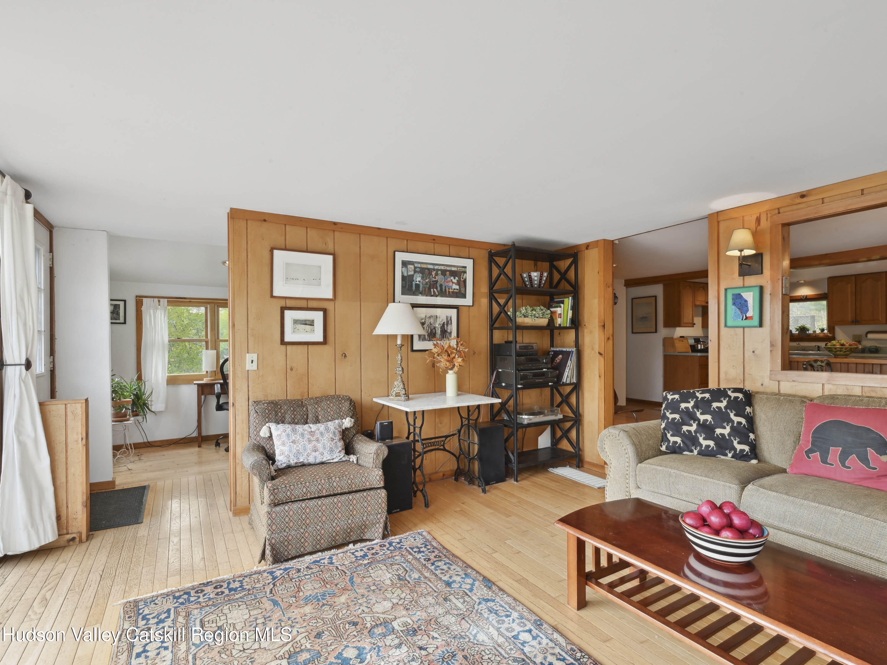 123 Maple Street Catskill, NY 12414 - Photo 12 of 47 a living room with furniture and a table