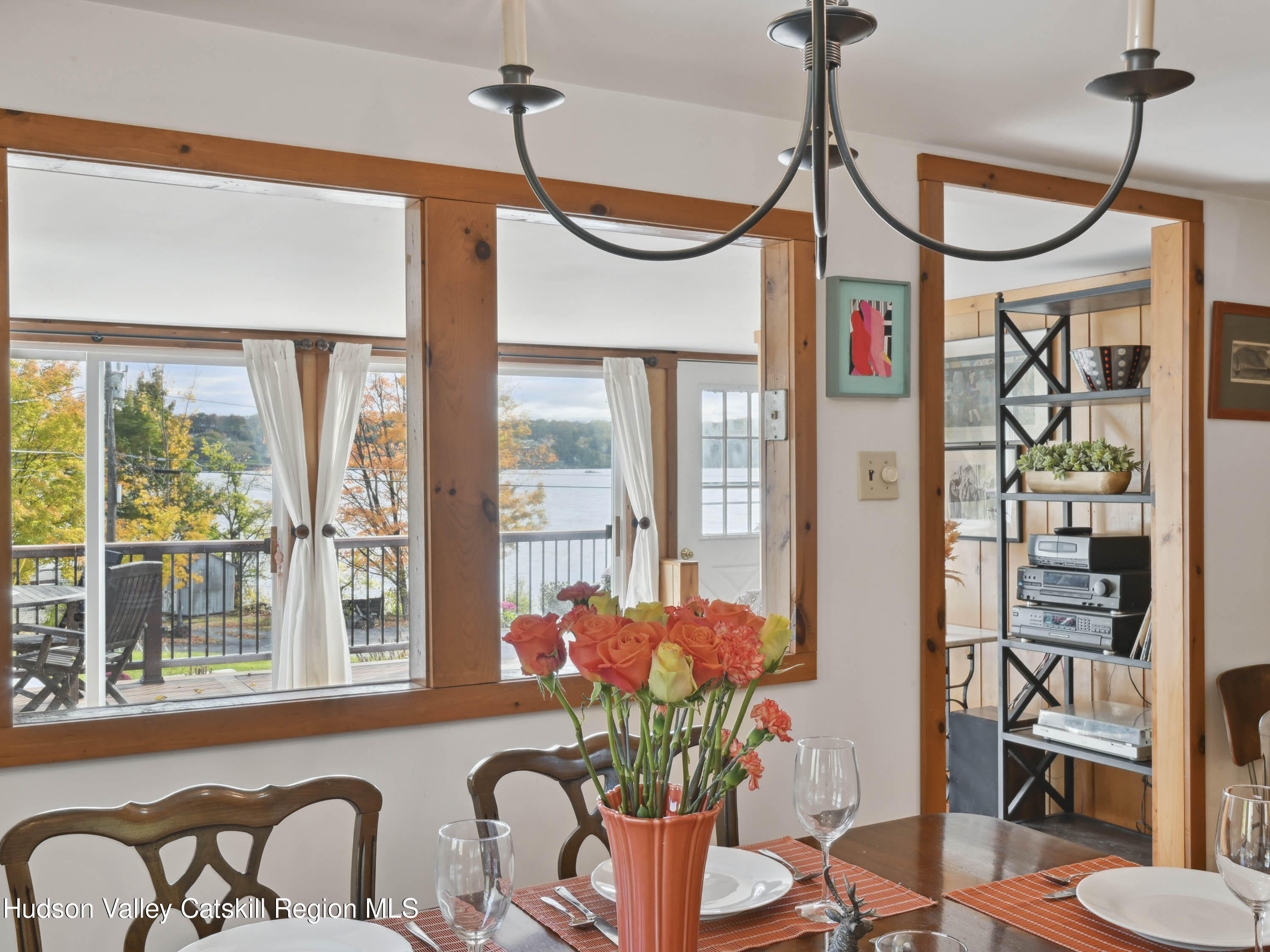 123 Maple Street Catskill, NY 12414 - Photo 14 of 47 a dining room with furniture a chandelier and window