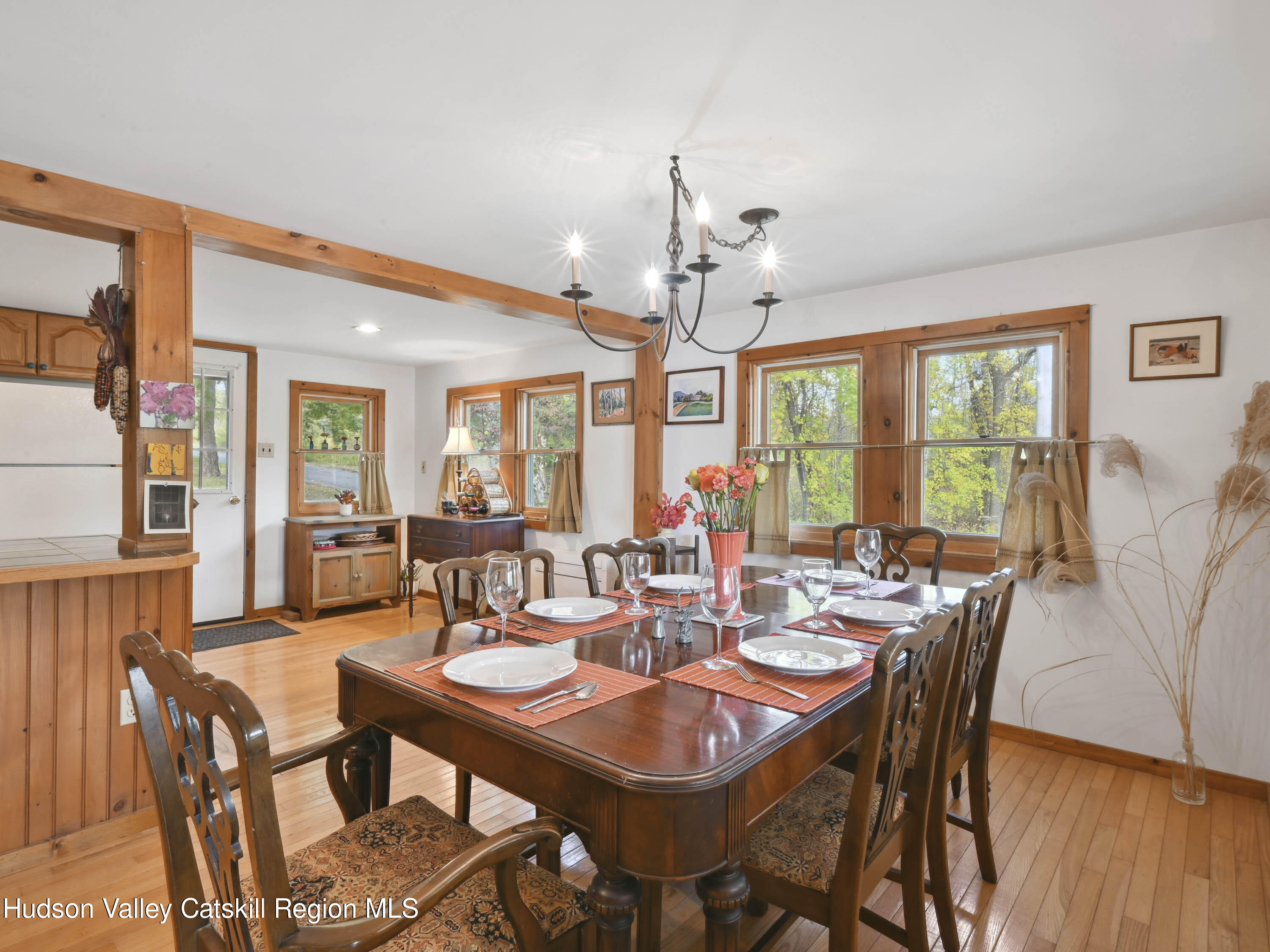 123 Maple Street Catskill, NY 12414 - Photo 15 of 47 a view of a dining room with furniture window and wooden floor