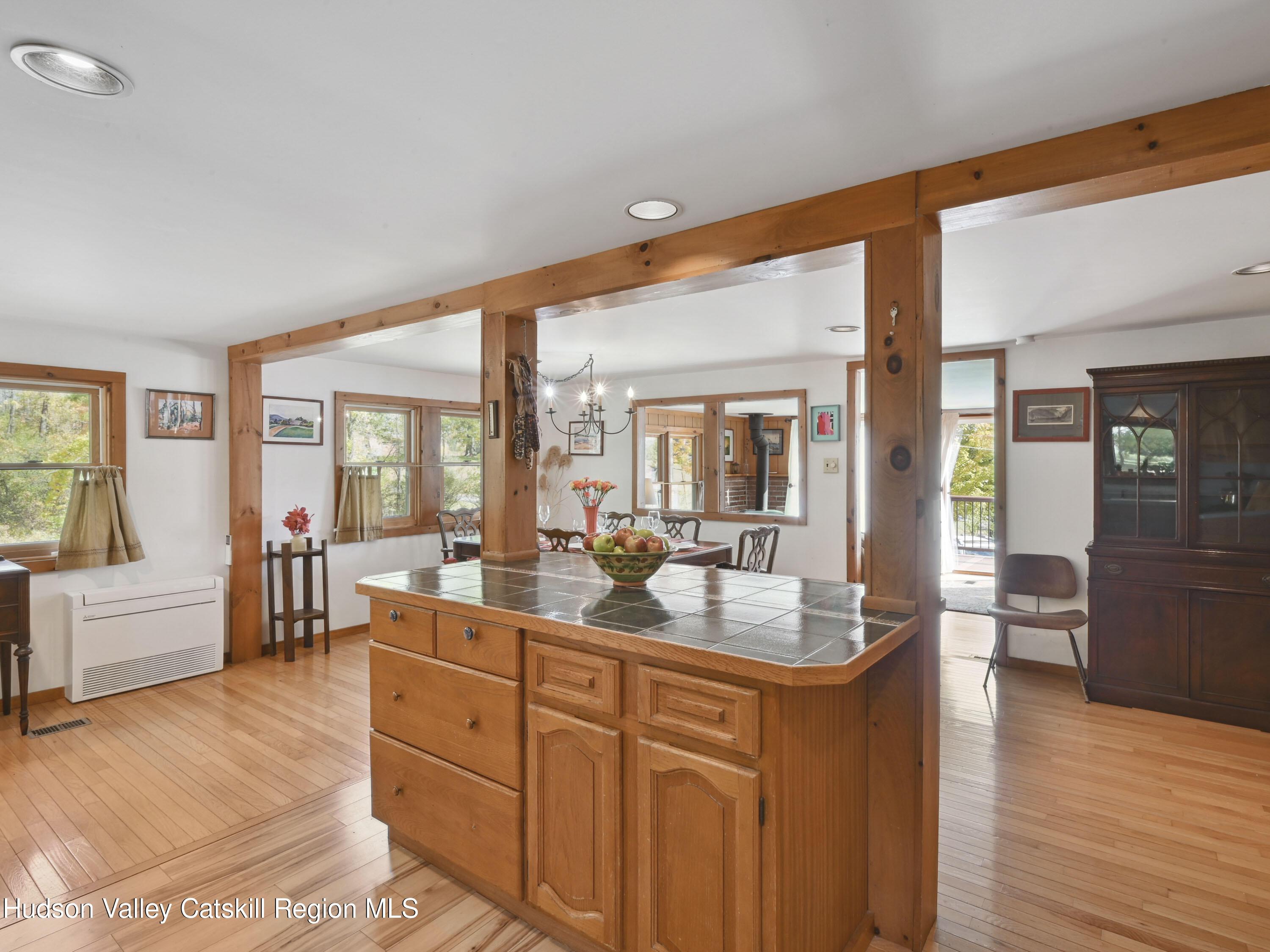 123 Maple Street Catskill, NY 12414 - Photo 16 of 47 a living room with stainless steel appliances granite countertop furniture a couch and wooden floor