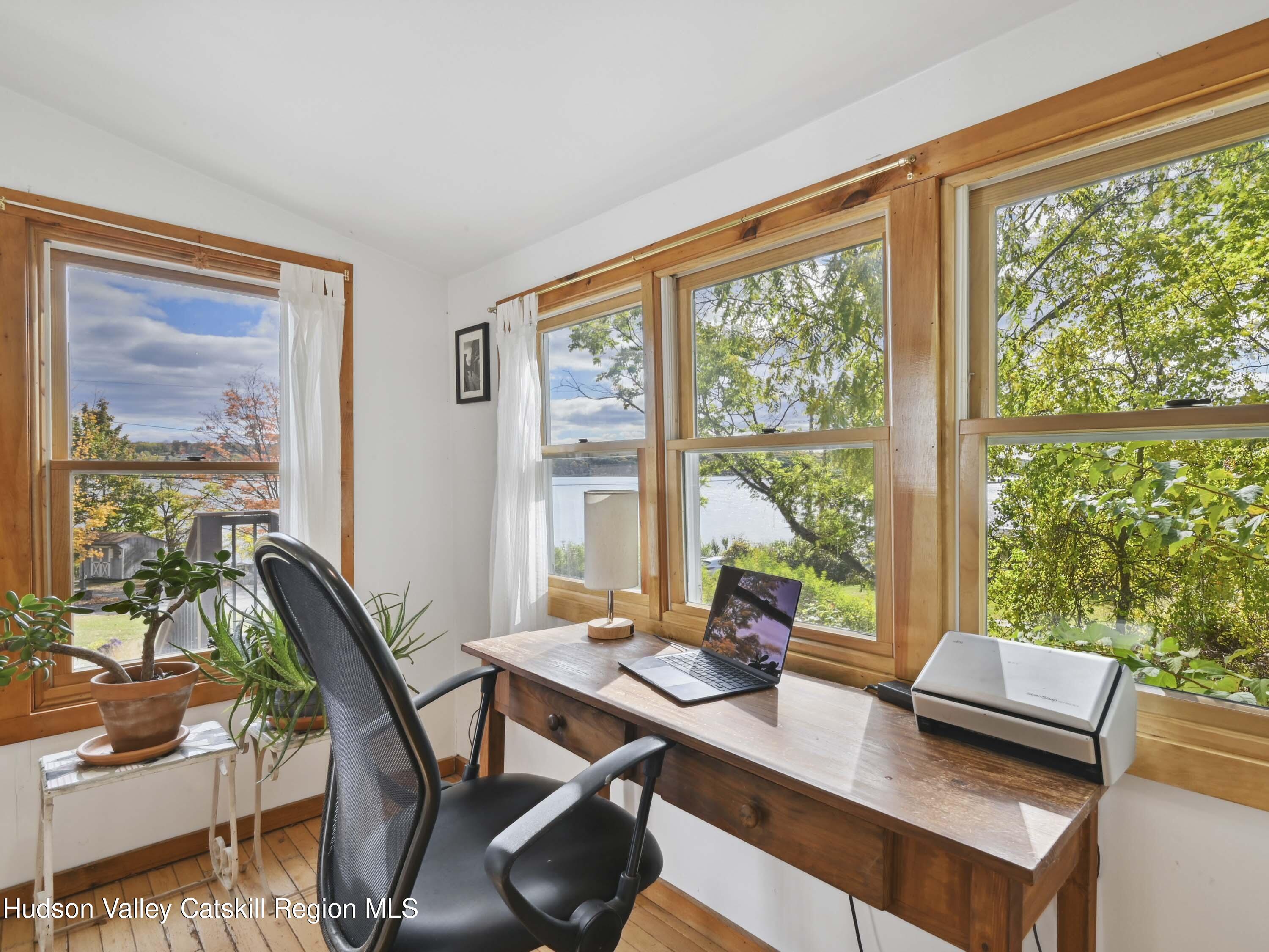 123 Maple Street Catskill, NY 12414 - Photo 20 of 47 a view of a workspace with a window