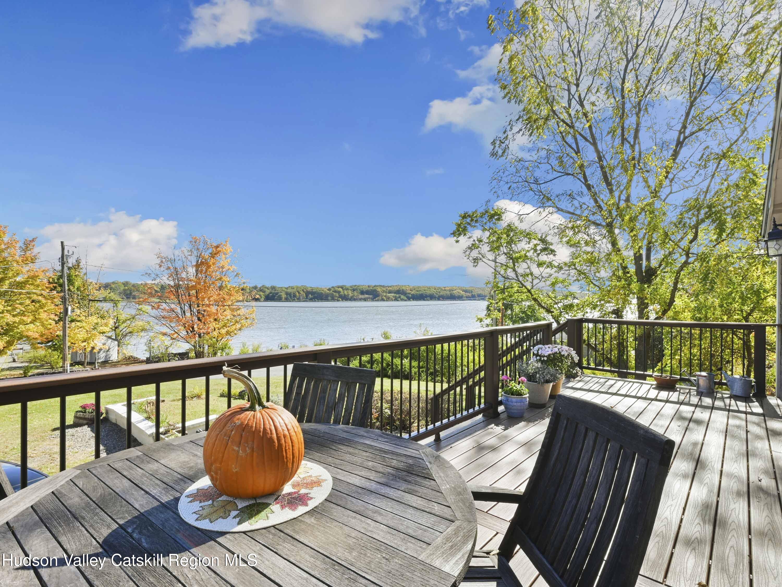 123 Maple Street Catskill, NY 12414 - Photo 2 of 47 a view of roof deck with wooden floor and seating space