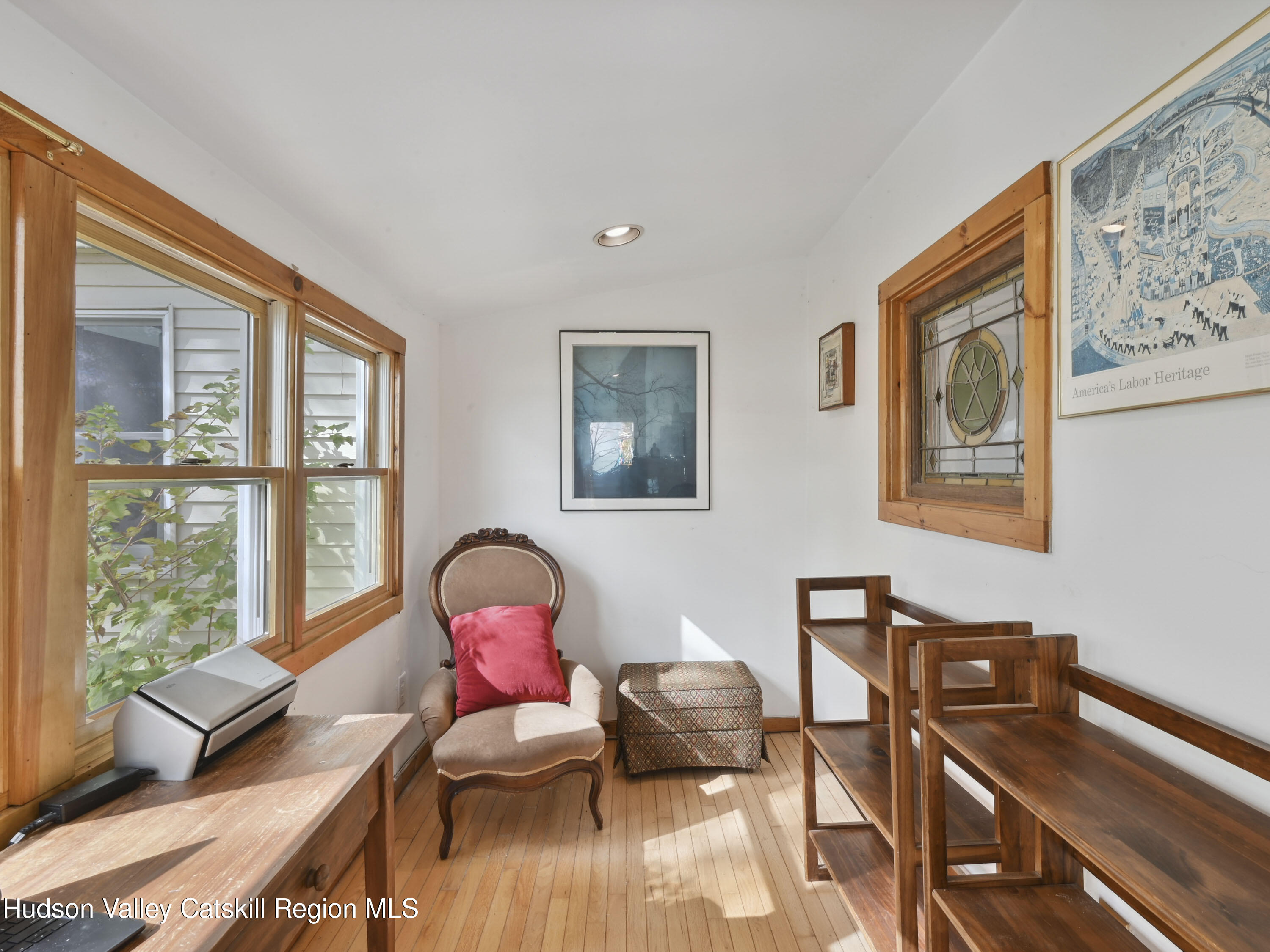 123 Maple Street Catskill, NY 12414 - Photo 22 of 47 a living room with furniture and floor to ceiling windows