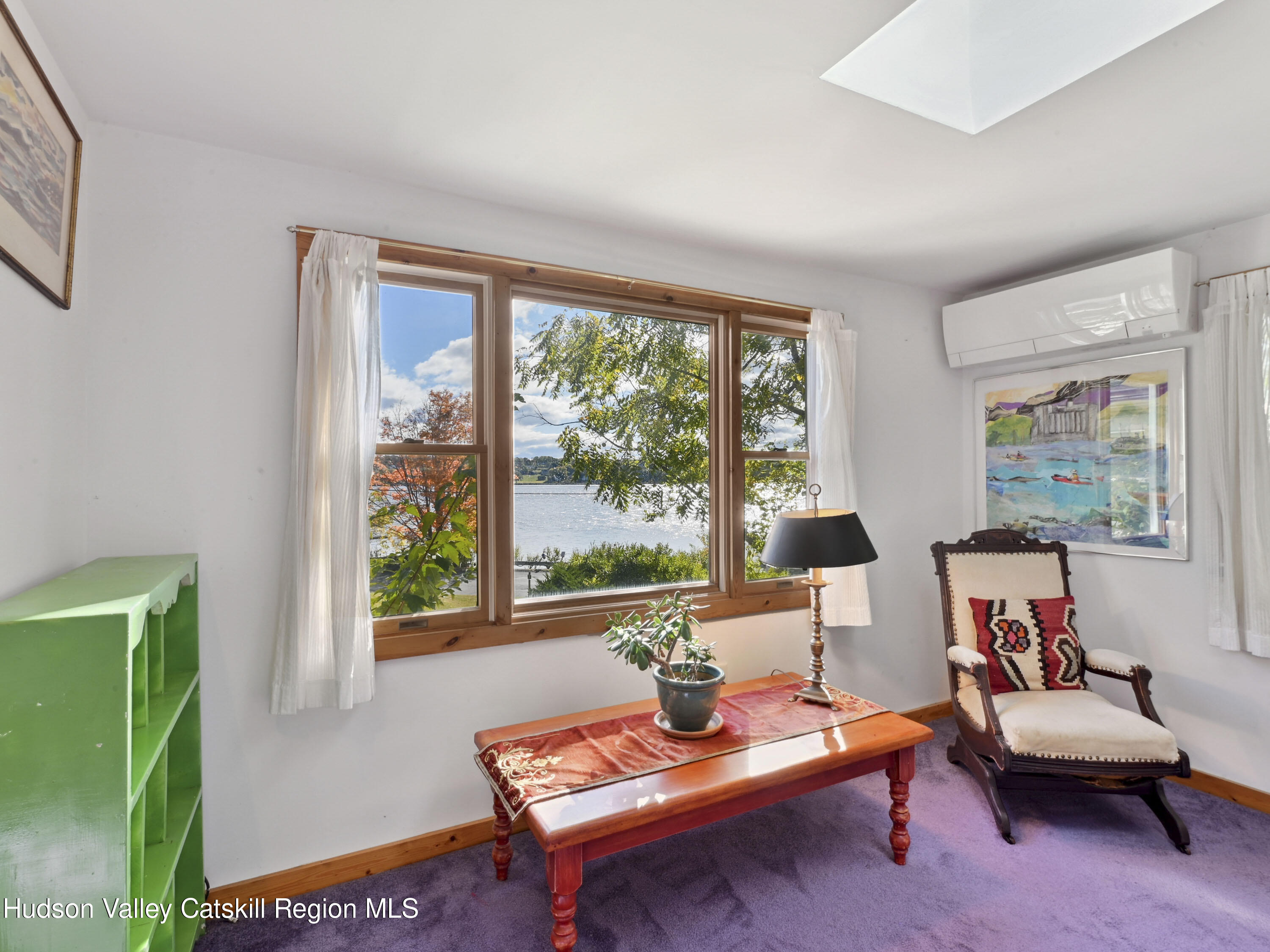 123 Maple Street Catskill, NY 12414 - Photo 27 of 47 a living room with furniture and a large window