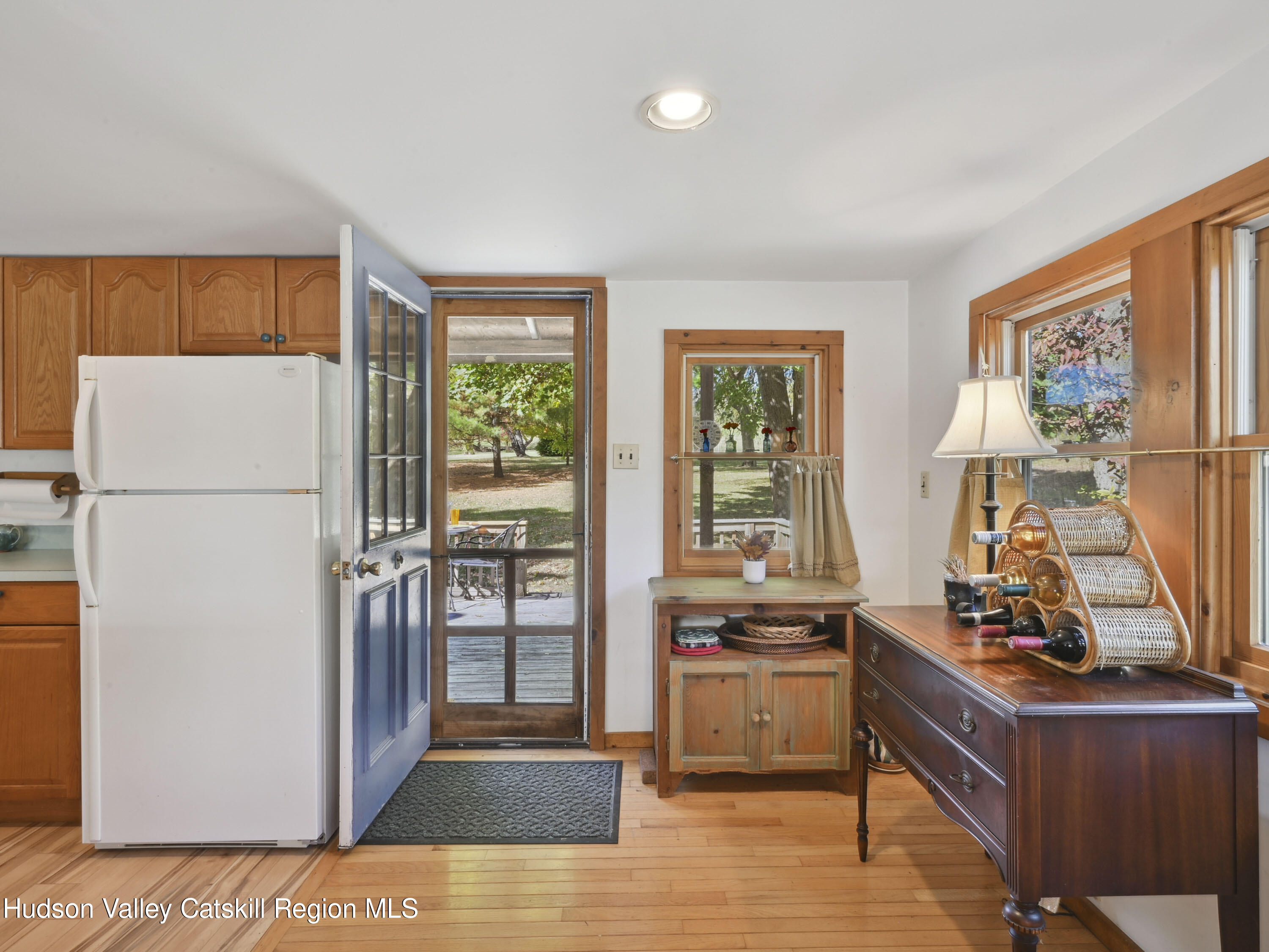 123 Maple Street Catskill, NY 12414 - Photo 30 of 47 a kitchen with stainless steel appliances granite countertop a refrigerator and a stove top oven