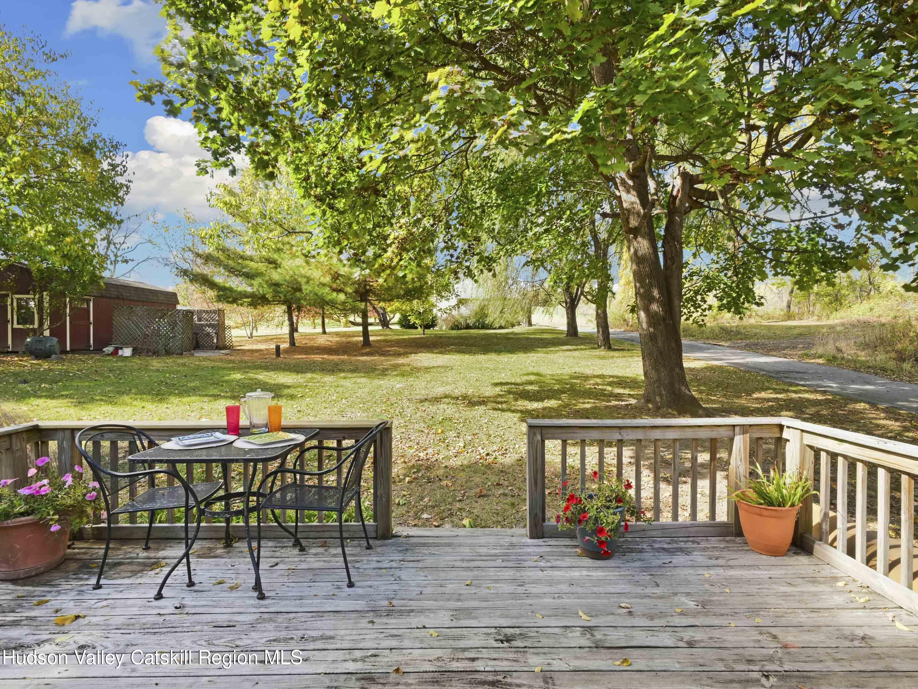 123 Maple Street Catskill, NY 12414 - Photo 31 of 47 an outdoor space with seating