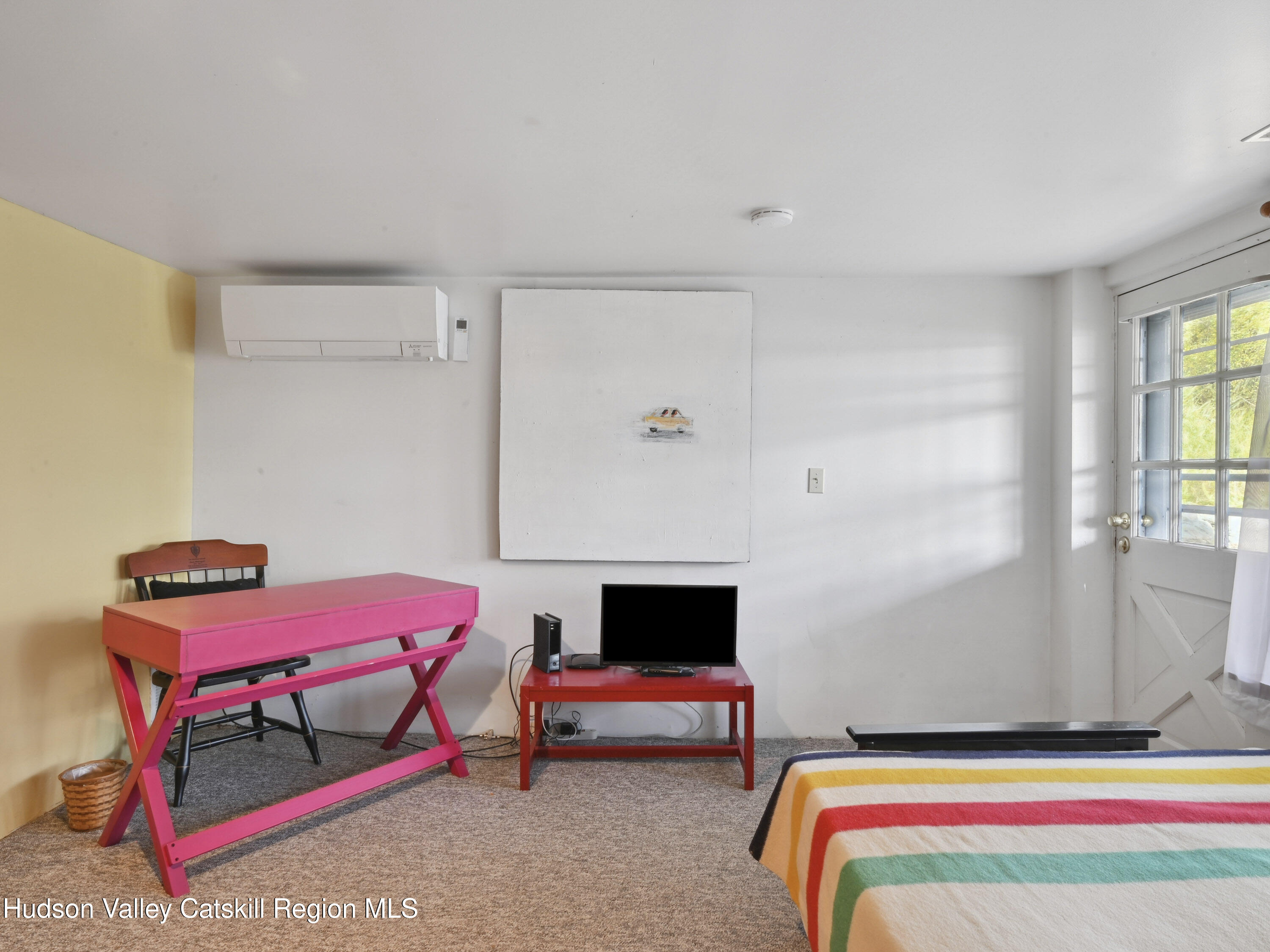 123 Maple Street Catskill, NY 12414 - Photo 36 of 47 a bedroom with furniture and a window