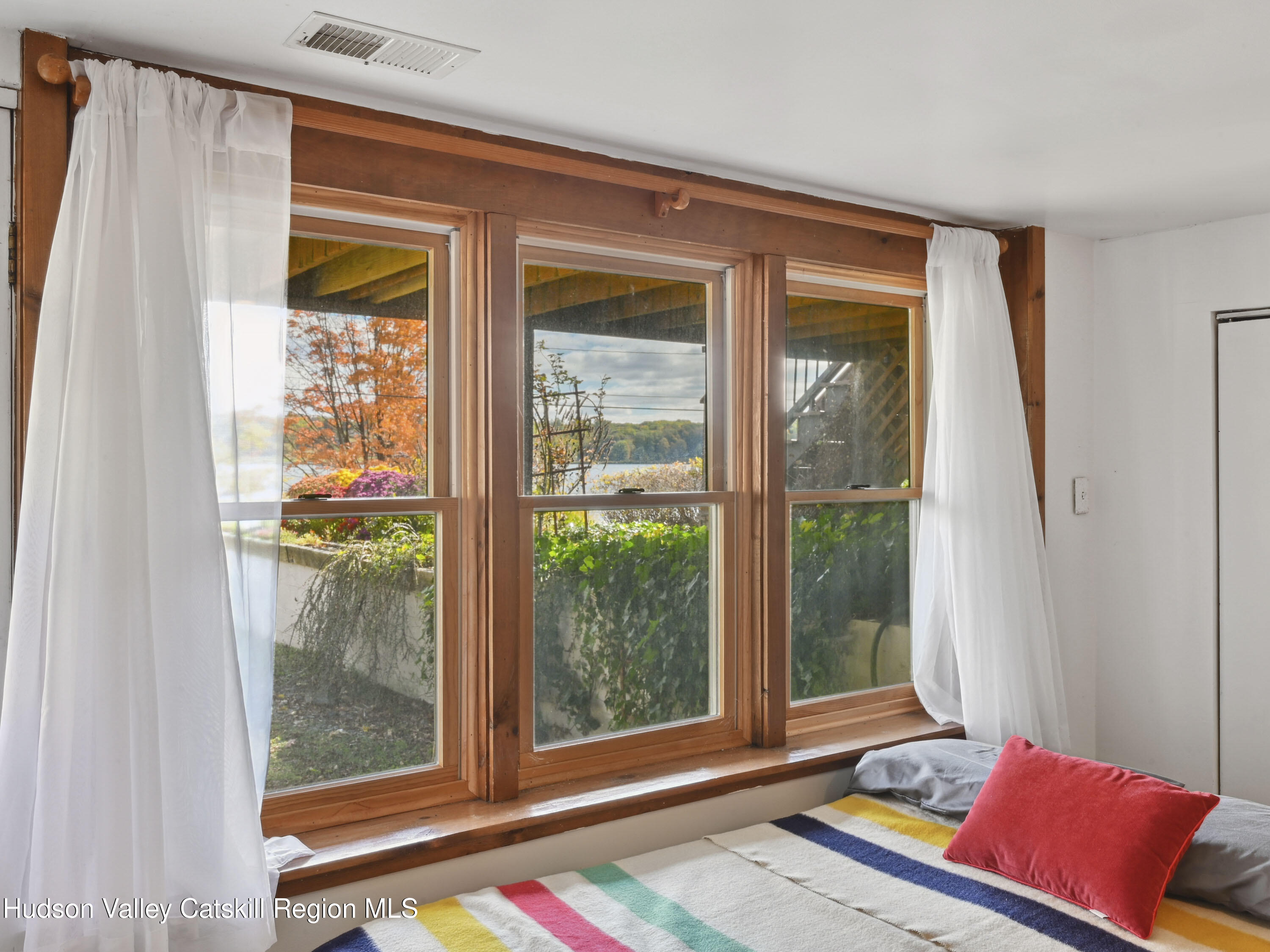 123 Maple Street Catskill, NY 12414 - Photo 39 of 47 a living room with furniture and a window