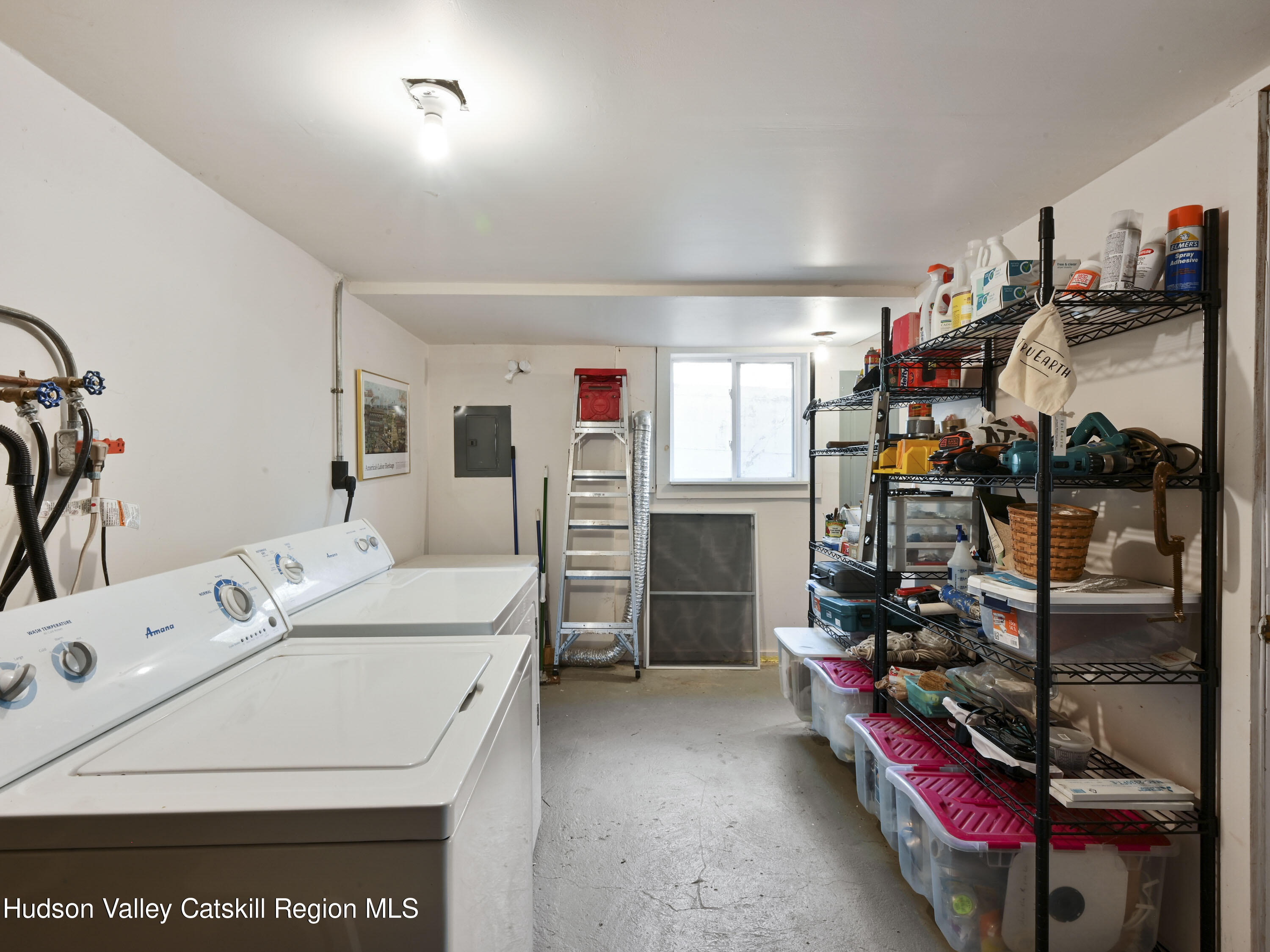 123 Maple Street Catskill, NY 12414 - Photo 45 of 47 a storage room with washer and dryer