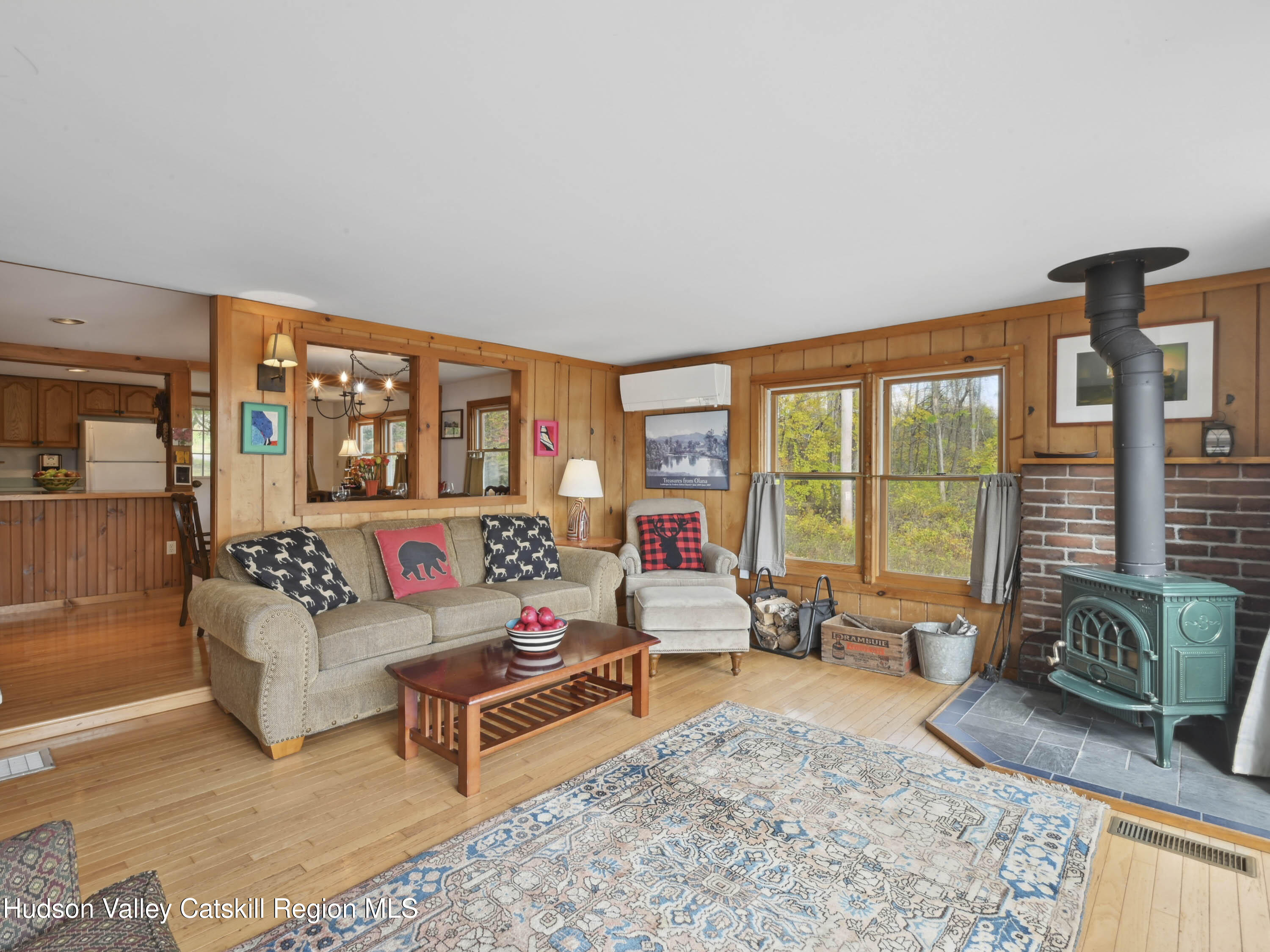 123 Maple Street Catskill, NY 12414 - Photo 5 of 47 a living room with furniture and a floor to ceiling window
