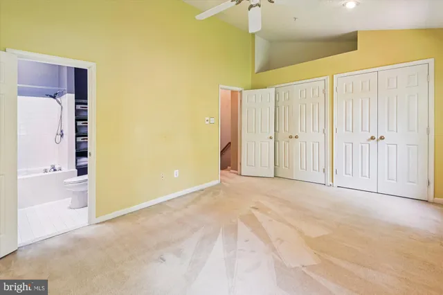 a view of empty room with windows