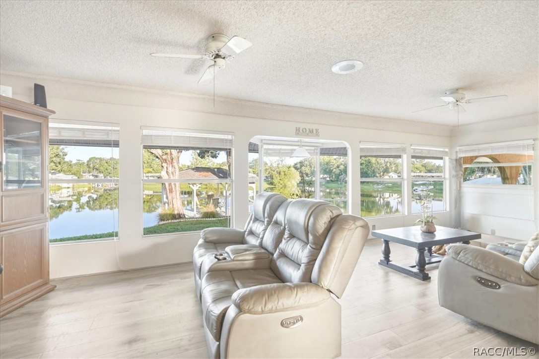 928 South Shad Terrace Inverness, FL 34450 - Photo 6 of 48 a living room with furniture and a large window
