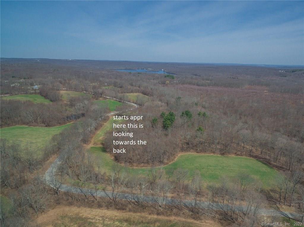 A Levita Road Lebanon, CT 06249 - Photo 1 of 1 a view of a dry yard with wooden fence