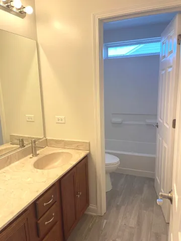 a view of a two chairs on the roof deck