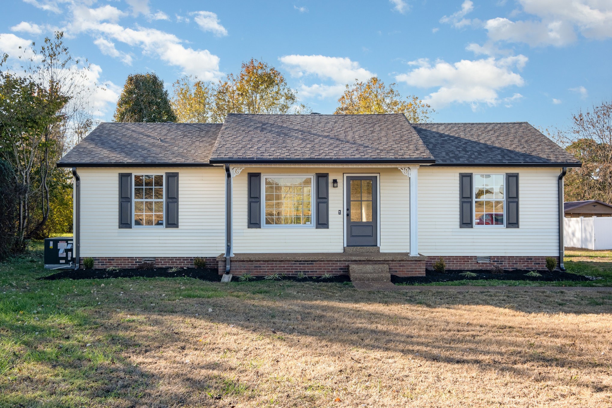 645 Airport Road Portland, TN 37148 - Photo 1 of 27 a front view of a house with a yard