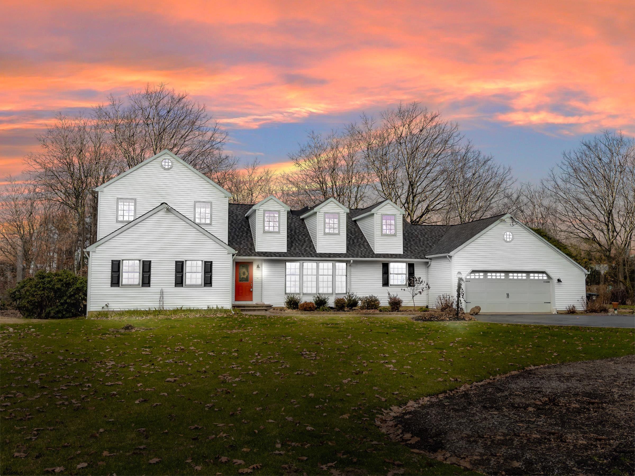 108 Weatherby Road Mullica Hill, NJ 08062 - Photo 1 of 18 a front view of a house with a yard