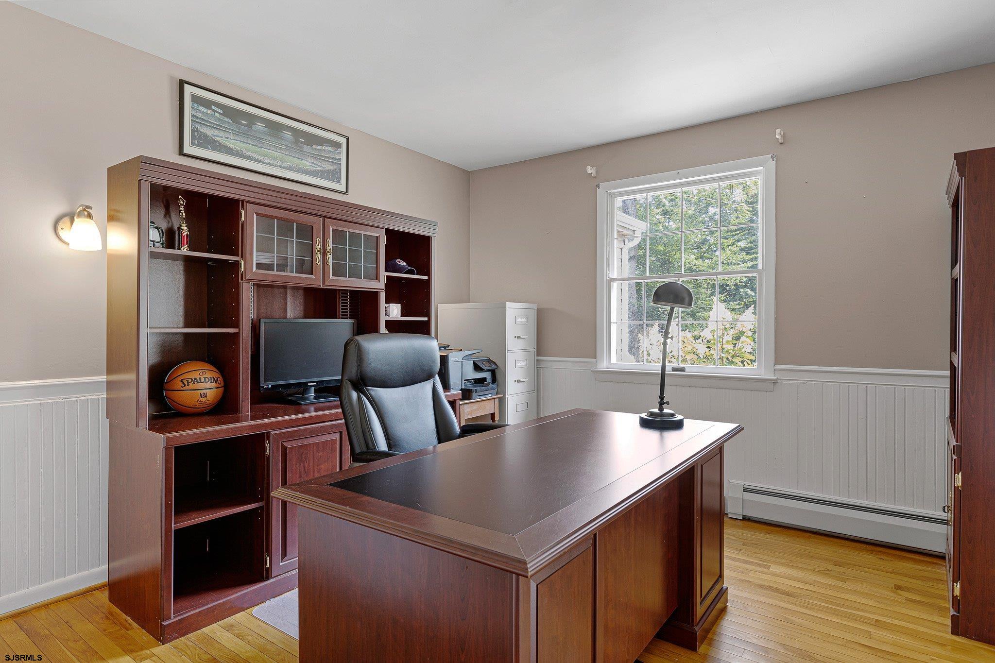 108 Weatherby Road Mullica Hill, NJ 08062 - Photo 7 of 18 a room with furniture and a book shelf