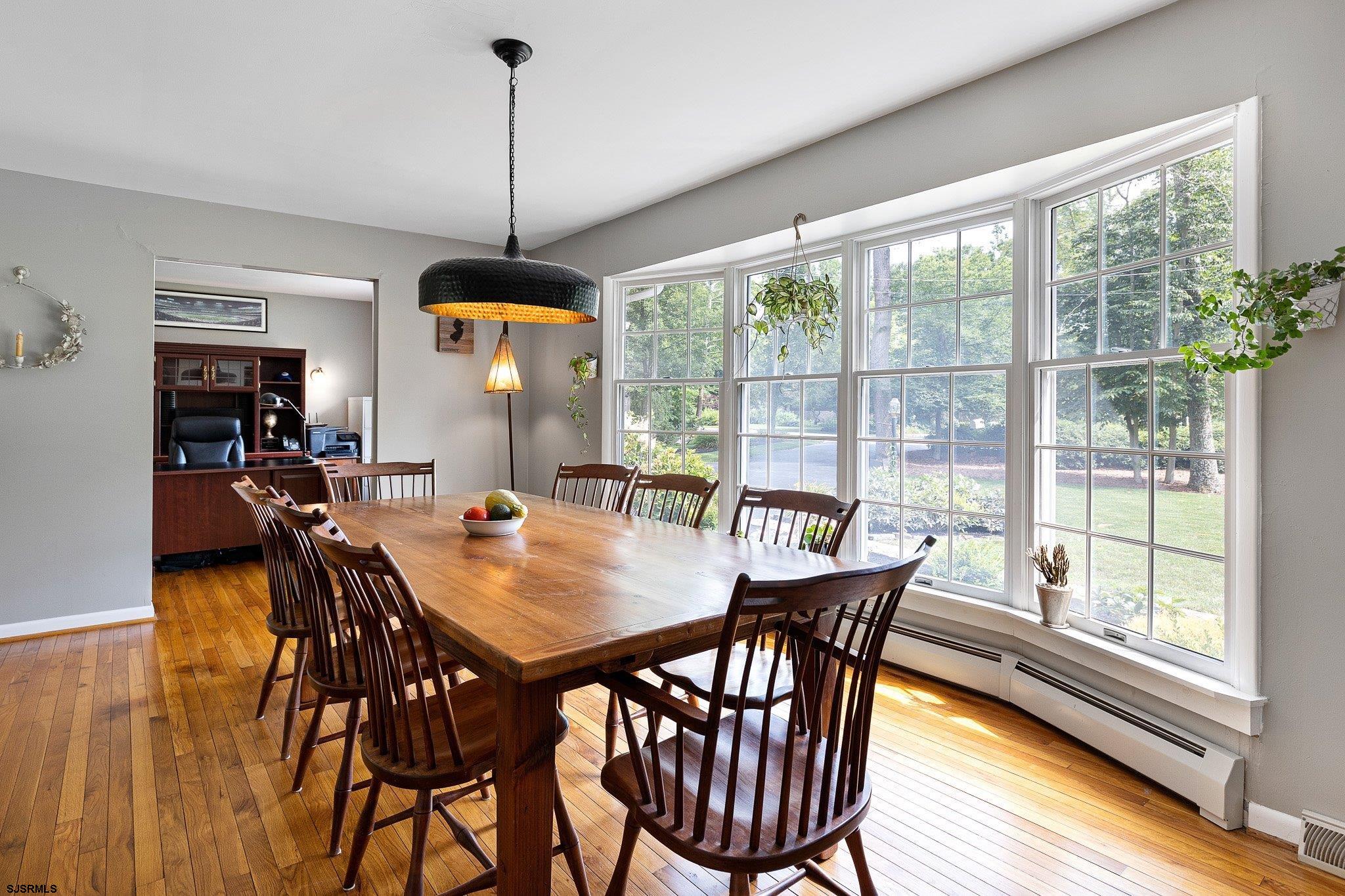 108 Weatherby Road Mullica Hill, NJ 08062 - Photo 8 of 18 a dining room with furniture window wooden floor