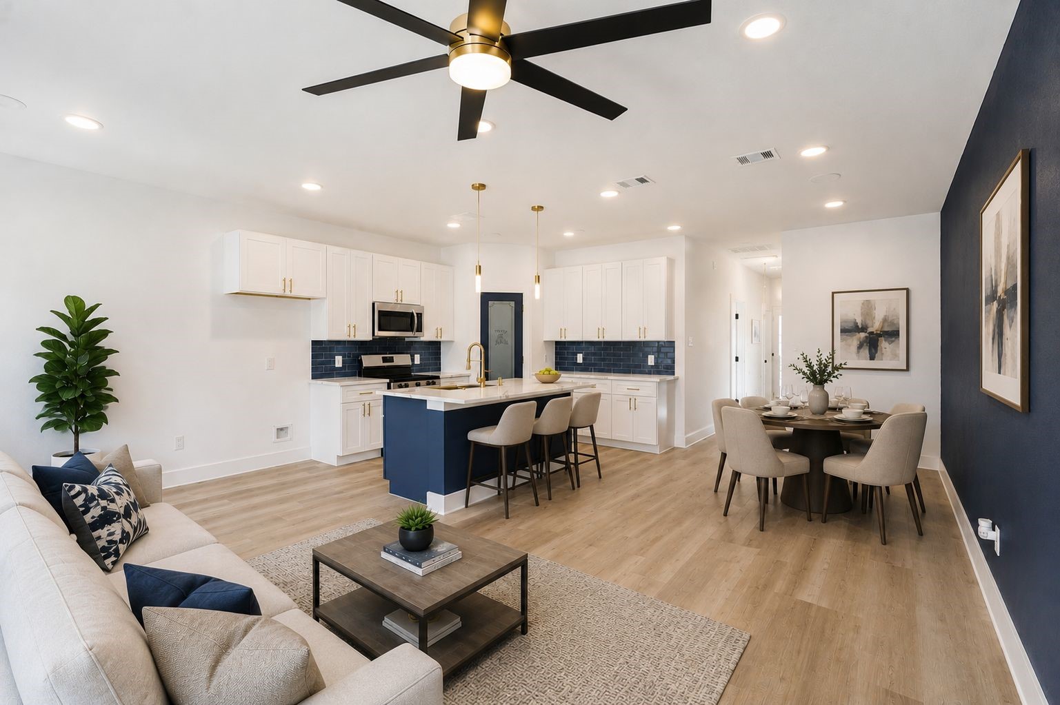 4606 Mallow Street, Unit B Houston, TX 77051 - Photo 4 of 25 a living room with furniture kitchen view and a potted plant