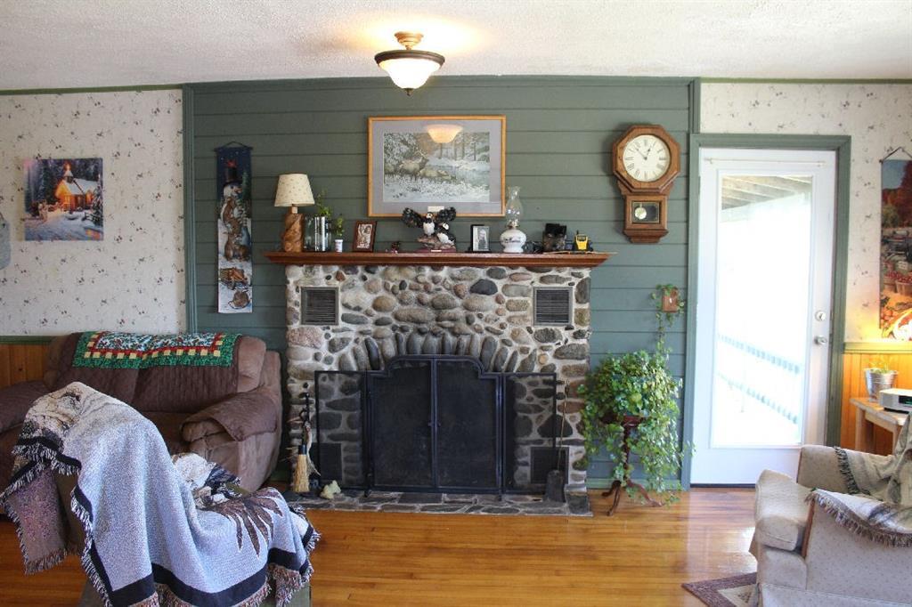 77 Lubec Road Whiting, ME 04691 - Photo 6 of 24 Living Room Fireplace