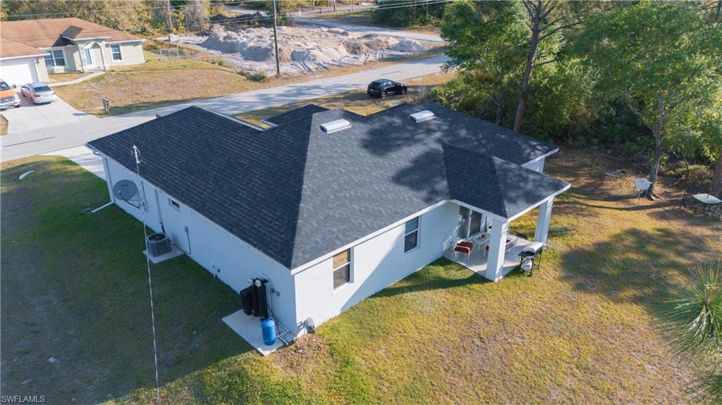 1503 West 17th Street Lehigh Acres, FL 33972 - Photo 23 of 26 a picture of houses with outdoor space