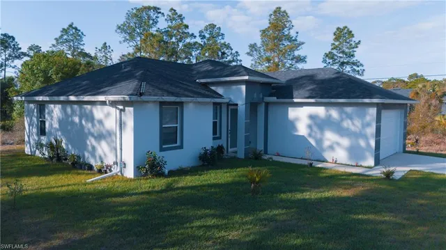 a view of a back yard of the house