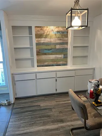 a bed room with a bed and mirror