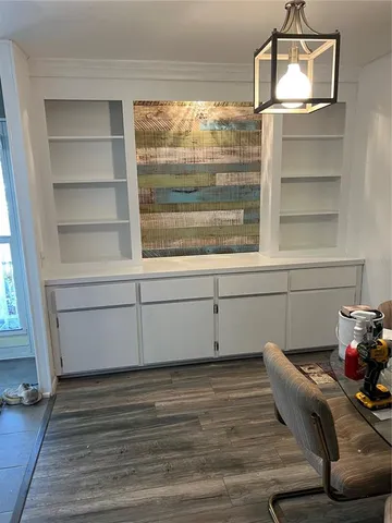 a bed room with a bed and mirror