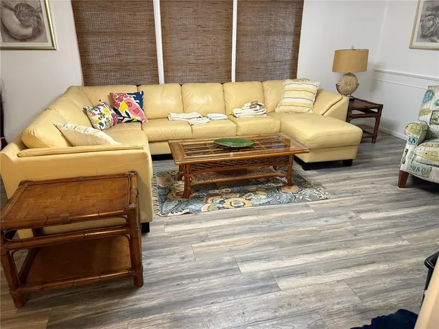 a room with furniture and a window