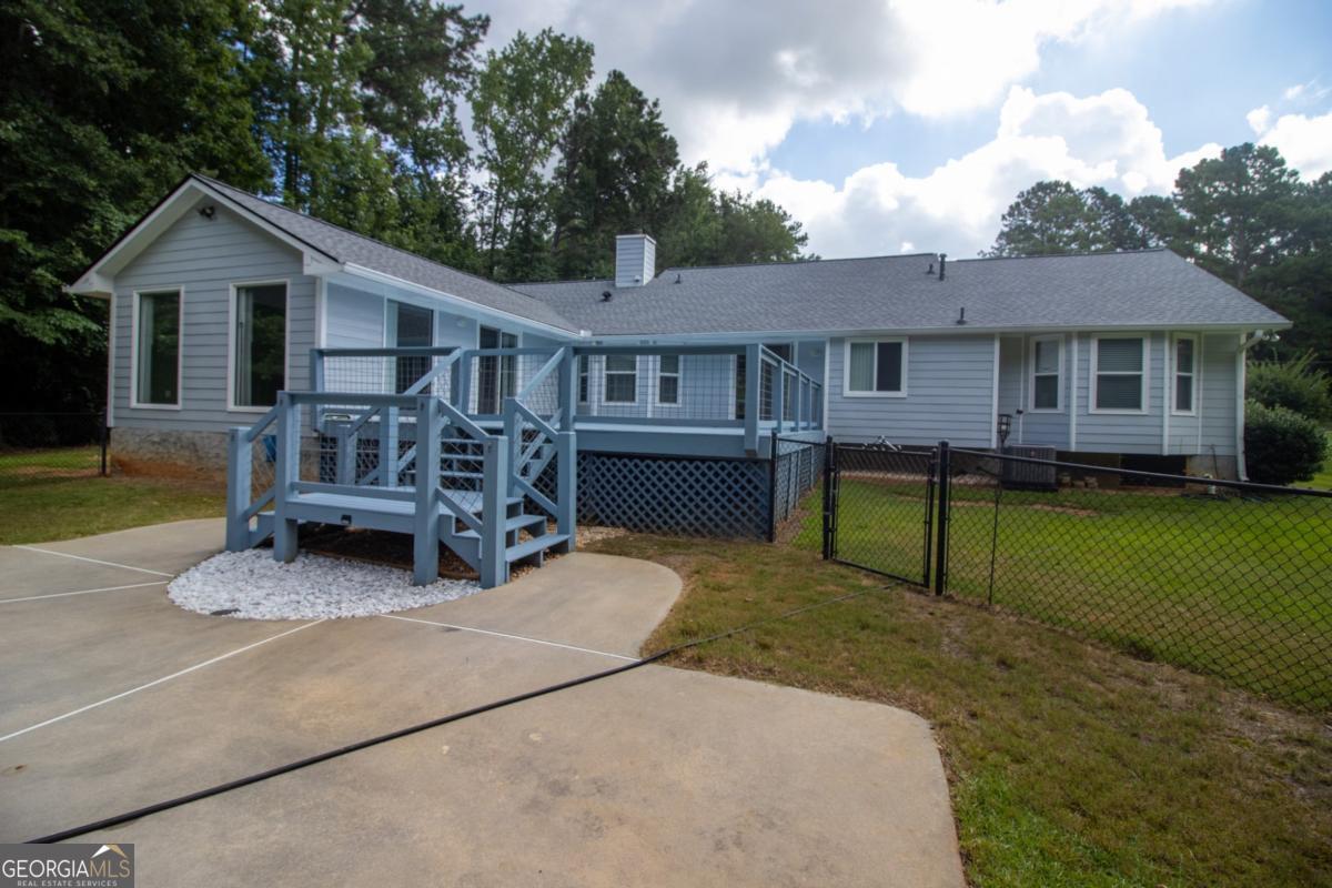 145 Deer Ridge Court McDonough, GA 30252 - Photo 46 of 54 front view of a house with a yard