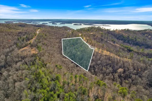 a view of a room with an ocean view and mountain view