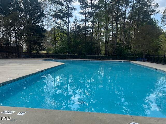 5115 Cardinal Grove Boulevard Raleigh, NC 27616 - Photo 30 of 36 a view of a back yard
