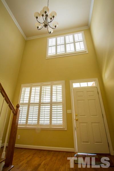 8027 Satillo Lane Raleigh, NC 27616 - Photo 2 of 25 2-story foyer with lots of light and plantation shutters!