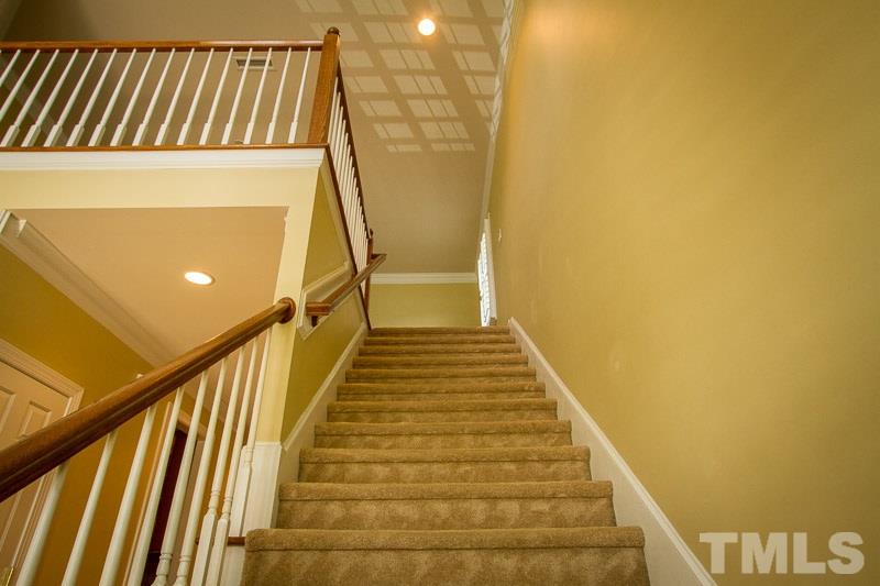 8027 Satillo Lane Raleigh, NC 27616 - Photo 16 of 25 Soaring ceilings in this townhome!