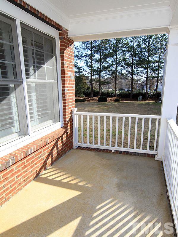 8027 Satillo Lane Raleigh, NC 27616 - Photo 22 of 25 Rocking chair front porch