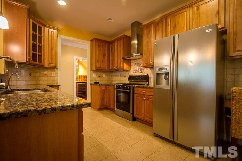 8027 Satillo Lane Raleigh, NC 27616 - Photo 5 of 25 Lots of room in your Chef's kitchen.