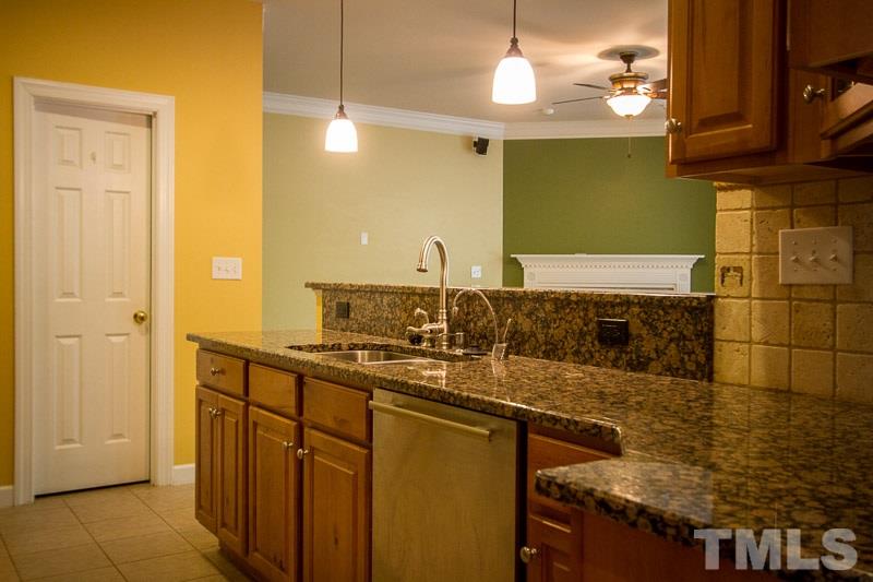 8027 Satillo Lane Raleigh, NC 27616 - Photo 6 of 25 Opens into the living room with lots of room to entertain!