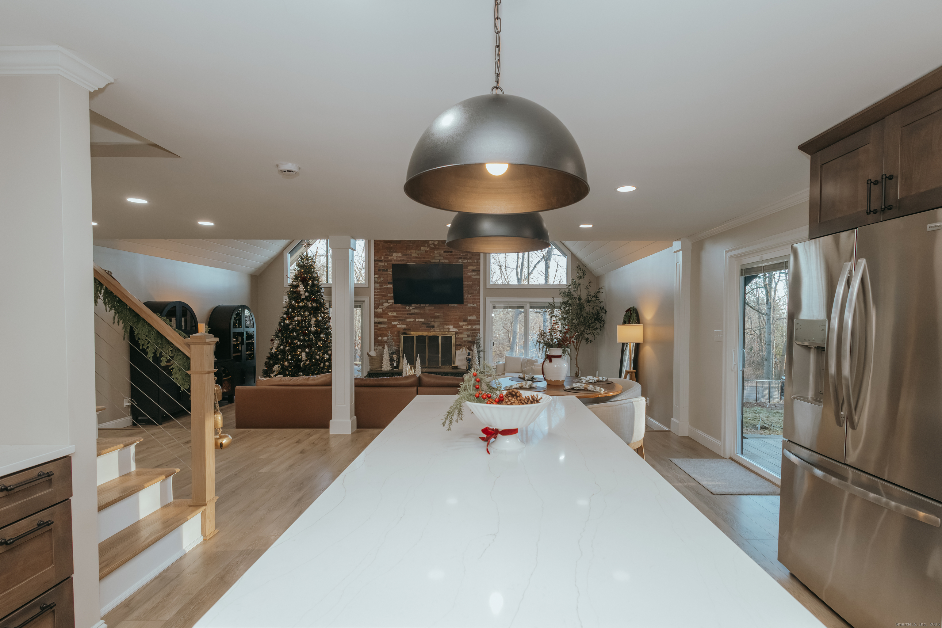 4 Moss Lane Wolcott, CT 06716 - Photo 21 of 40 a open kitchen with stainless steel appliances granite countertop a refrigerator and a counter top space
