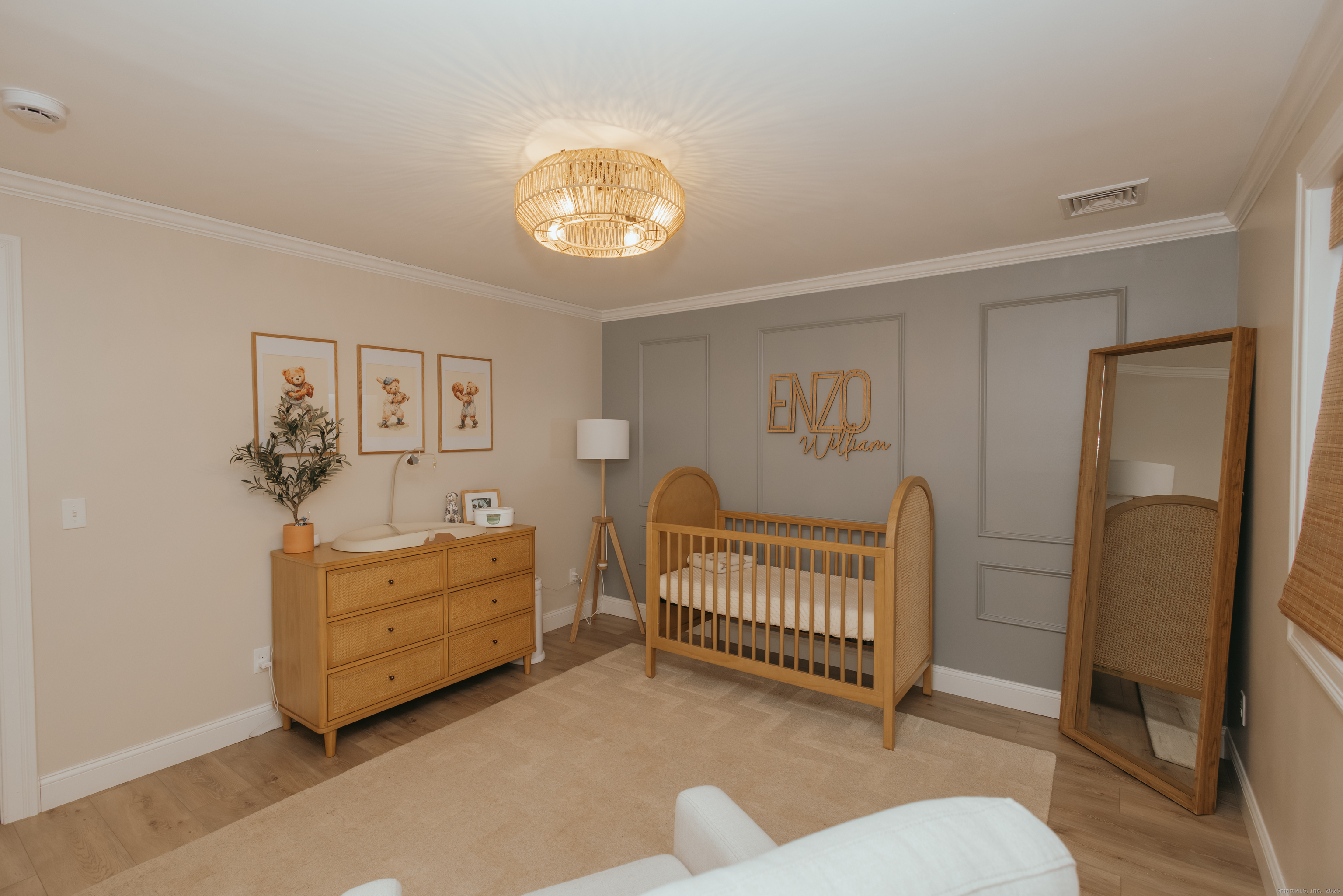 4 Moss Lane Wolcott, CT 06716 - Photo 26 of 40 a view of a bedroom with baby bed and windows