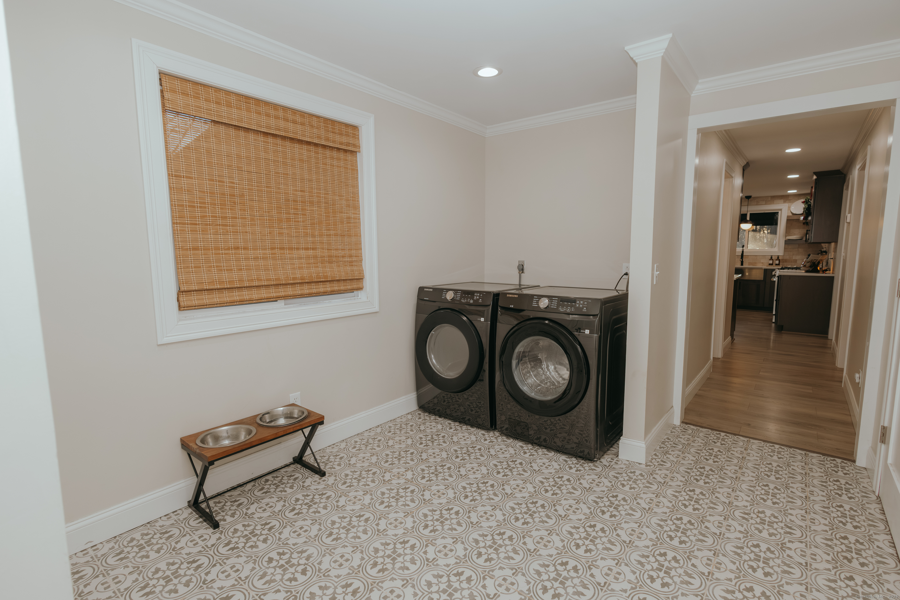 4 Moss Lane Wolcott, CT 06716 - Photo 28 of 40 a view of a livingroom with washer and dryer
