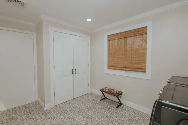 a room that has a chair and wooden floor