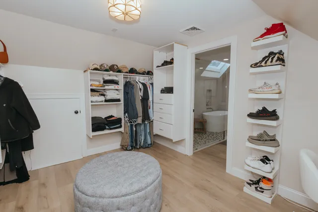 a view of livingroom with furniture and closet